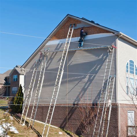 brick house metal cover|siding over brick panels.